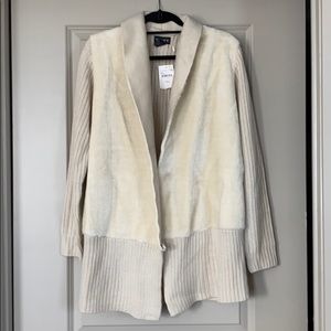 Knit sweater with fur